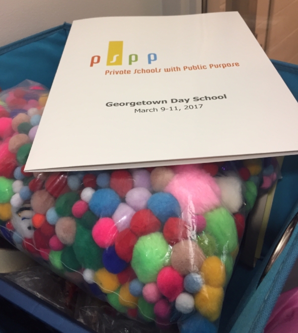  Our trusty bin of workshop supplies: pom poms, crayons, handouts, and more! 