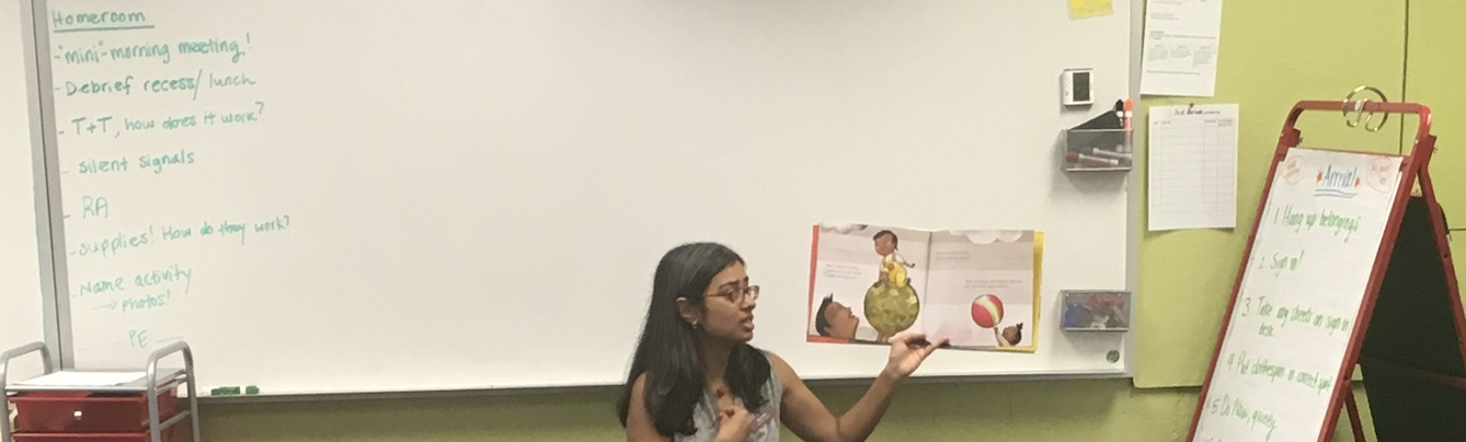  Back to school read aloud with a detailed roadmap on the board behind me. 